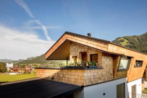 a house with a view of a roof at Das Heimsitz in Brixen im Thale