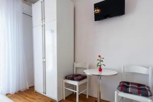 Televízia a/alebo spoločenská miestnosť v ubytovaní Vacation house Maslina