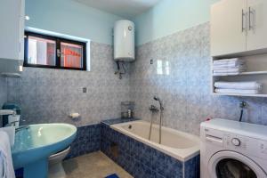 Kúpeľňa v ubytovaní Vacation house Maslina