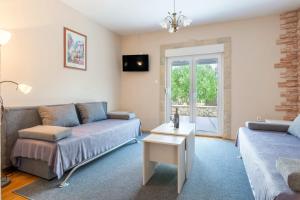 Posteľ alebo postele v izbe v ubytovaní Vacation house Maslina