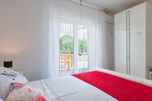 Posteľ alebo postele v izbe v ubytovaní Vacation house Maslina