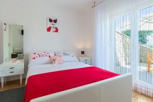 Posteľ alebo postele v izbe v ubytovaní Vacation house Maslina