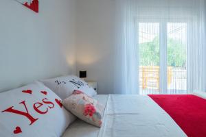 Posteľ alebo postele v izbe v ubytovaní Vacation house Maslina