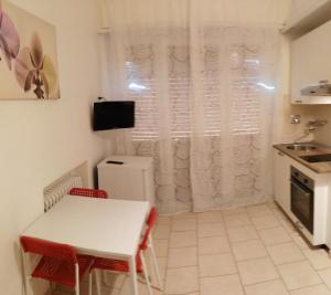 A kitchen or kitchenette at Residence Hotel Vittoria