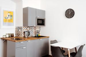 Kuchyňa alebo kuchynka v ubytovaní Apartment Gesse Jirsikova