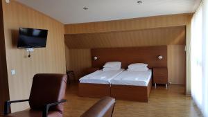 TV a/nebo společenská místnost v ubytování Hotel Del Mar + 37 fotografií