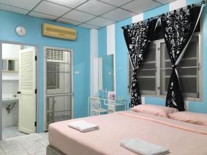 Postel nebo postele na pokoji v ubytování Park Avenue@Huamark + 53 fotografií