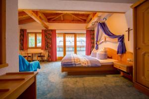 Ένα ή περισσότερα κρεβάτια σε δωμάτιο στο Haus Diana