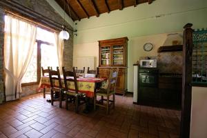 A kitchen or kitchenette at Il Nido - Private villa with pool and jacuzzi
