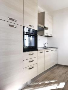 Кухня или мини-кухня в Minisuite Zefiro-Intero appartamento ad uso esclusivo by Appartamenti Petrucci
