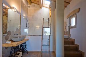 a bathroom with a sink and a shower at Tabano Ristorante-Casolare in Iesi +37 photos