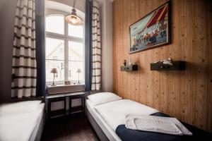 Ένα ή περισσότερα κρεβάτια σε δωμάτιο στο Postel Wolgast