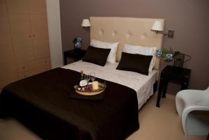 Postel nebo postele na pokoji v ubytování Villa Kapheira + 29 fotografií