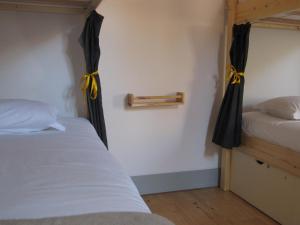 Cama ou camas em um quarto em Most Art Boutique Hostel