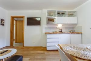 Kuchyň nebo kuchyňský kout v ubytování Apartments No.59 Loket