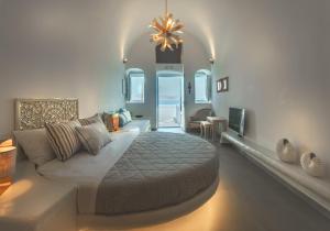 Ένα ή περισσότερα κρεβάτια σε δωμάτιο στο Secret Legend Suites