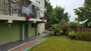 A garden outside Aheloy Apartments