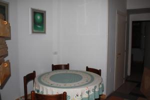 a table in a room with a table cloth on it at Appartamento Prima Fila mare in Cupra Marittima