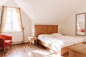 Łóżko lub łóżka w pokoju w obiekcie Gästehaus Annemaria