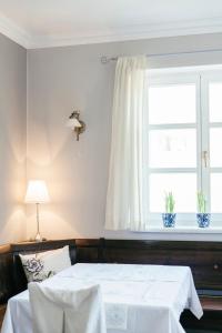 Giường trong phòng chung tại Gästehaus Annemaria
