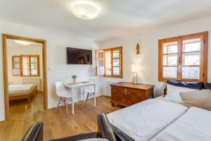 Postel nebo postele na pokoji v ubytování Apartments No.59 Loket