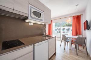 Una cocina o zona de cocina en Typic Oasis Sa Tanca