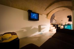 TV a/nebo společenská místnost v ubytování San Giovanni Vecchio - Residenza