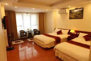 Кровать или кровати в номере Son Ha Hotel SAPA