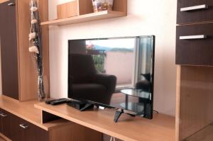 TV a/nebo společenská místnost v ubytování Apartment Kraljević