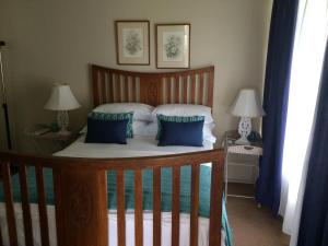Postel nebo postele na pokoji v ubytování Breeze Inn Guesthouse