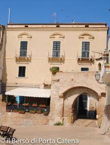a building with an archway in front of it at Il Bersó di Porta Catena in Vasto