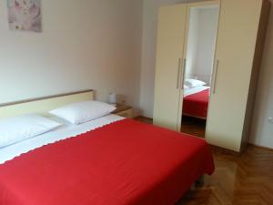 Posteľ alebo postele v izbe v ubytovaní Apartment Branko + 10 fotografií