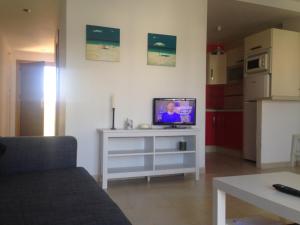 Et tv og/eller underholdning på Residencial Zahazar