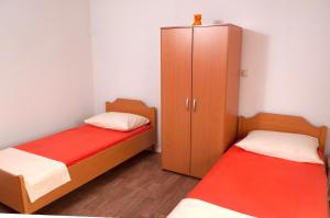 Postel nebo postele na pokoji v ubytování Apartment Kraljević