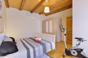 Postel nebo postele na pokoji v ubytování Holiday Home Batelani