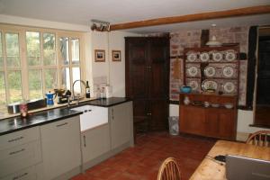 Nhà bếp/bếp nhỏ tại Chestnut Cottage