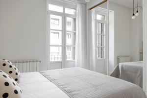 Posteľ alebo postele v izbe v ubytovaní Zubieta Suite by FeelFree Rentals