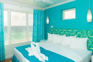 Кровать или кровати в номере Rostrevor Hotel
