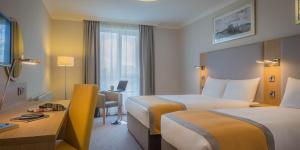 Krevet ili kreveti u jedinici u okviru objekta Maldron Hotel Tallaght