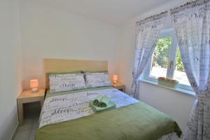 Un pat sau paturi într-o cameră la Villa CasaBlanca