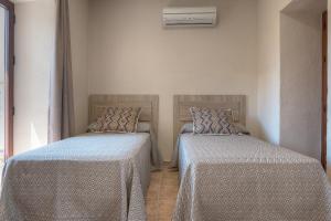 Cama o camas de una habitación en La Torre