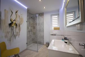 Koupelna v ubytování Apart Harmony - Apartamenty Baltic Harmony + 95 fotografií