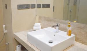 Koupelna v ubytování Hotel Grand Maple