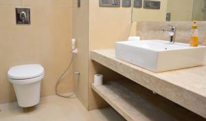 Koupelna v ubytování Hotel Grand Maple