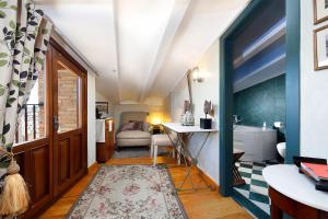 A bed or beds in a room at Hotel Boutique Maribel (Adult Only)