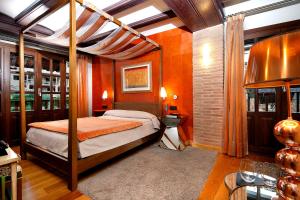 A bed or beds in a room at Hotel Boutique Maribel (Adult Only)