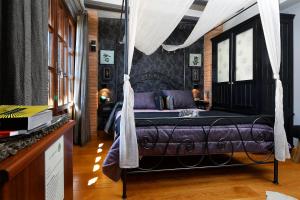A bed or beds in a room at Hotel Boutique Maribel (Adult Only)