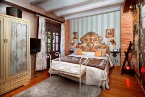 A bed or beds in a room at Hotel Boutique Maribel (Adult Only)