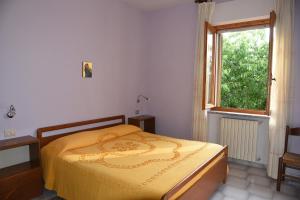 Postel nebo postele na pokoji v ubytování Albergo Dei Bersaglieri + 17 fotografií