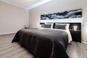 Postel nebo postele na pokoji v ubytování Residenza Navona Verona